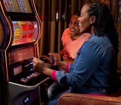 Lucky Twins slot interface showing dual-character bonus feature and payline layout